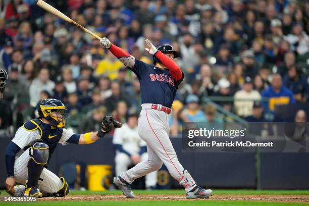 Masataka Yoshida of the Boston Red Sox hits a solo home run in the eighth inning against the Milwaukee Brewers at American Family Field on April 23,...