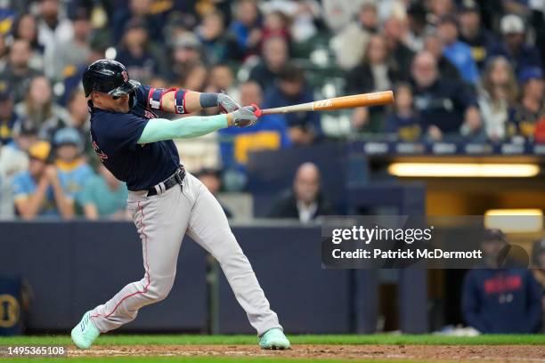 Enrique Hernandez of the Boston Red Sox hits against the Milwaukee Brewers in the eighth inning at American Family Field on April 23, 2023 in...