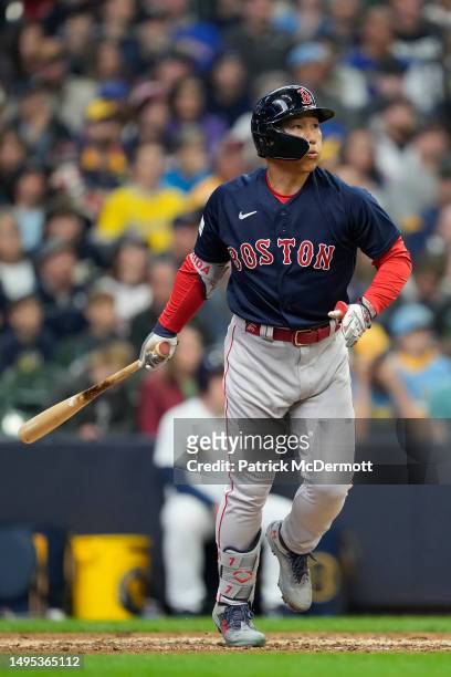 Masataka Yoshida of the Boston Red Sox hits a solo home run in the eighth inning against the Milwaukee Brewers at American Family Field on April 23,...