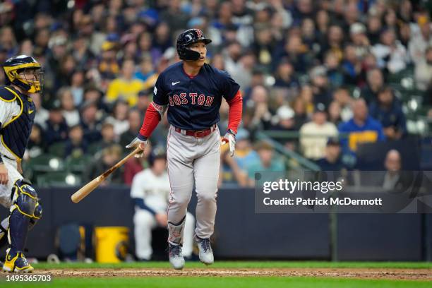 Masataka Yoshida of the Boston Red Sox hits a solo home run in the eighth inning against the Milwaukee Brewers at American Family Field on April 23,...