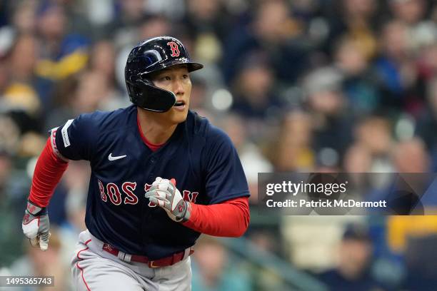 Masataka Yoshida of the Boston Red Sox runs the bases after hitting a solo home run in the eighth inning against the Milwaukee Brewers at American...