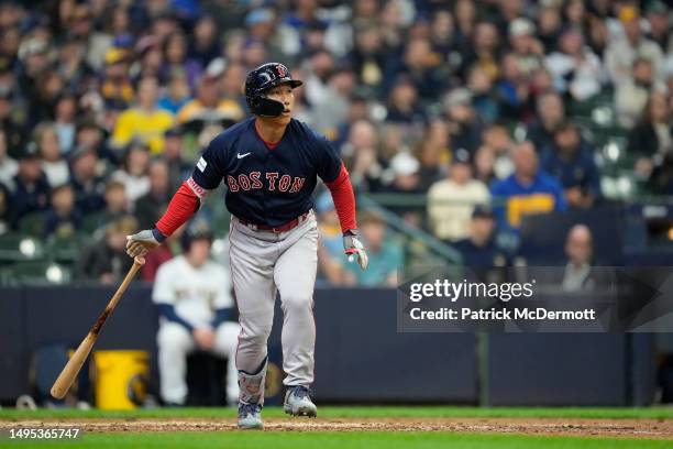 Masataka Yoshida of the Boston Red Sox hits a solo home run in the eighth inning against the Milwaukee Brewers at American Family Field on April 23,...