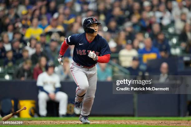 Masataka Yoshida of the Boston Red Sox hits a solo home run in the eighth inning against the Milwaukee Brewers at American Family Field on April 23,...