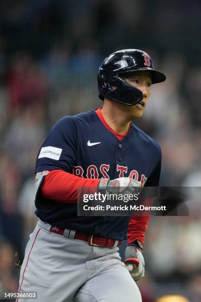 Masataka Yoshida of the Boston Red Sox runs the bases after hitting a solo home run in the eighth inning against the Milwaukee Brewers at American...