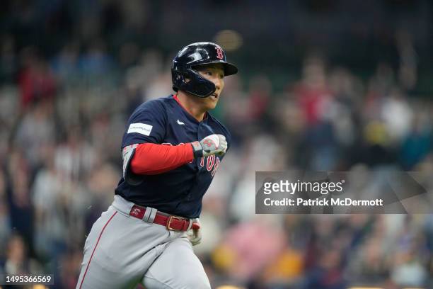Masataka Yoshida of the Boston Red Sox runs the bases after hitting a solo home run in the eighth inning against the Milwaukee Brewers at American...
