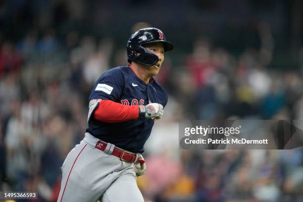 Masataka Yoshida of the Boston Red Sox runs the bases after hitting a solo home run in the eighth inning against the Milwaukee Brewers at American...