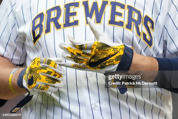 Detail view as Rowdy Tellez of the Milwaukee Brewers takes off his Nike batting gloves against the Boston Red Sox after the seventh inning at...