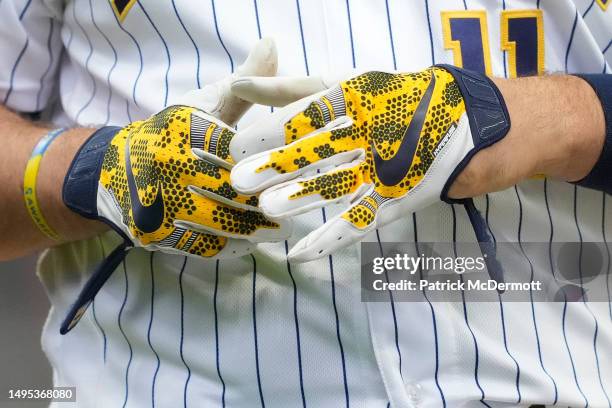 Detail view as Rowdy Tellez of the Milwaukee Brewers takes off his Nike batting gloves against the Boston Red Sox after the seventh inning at...