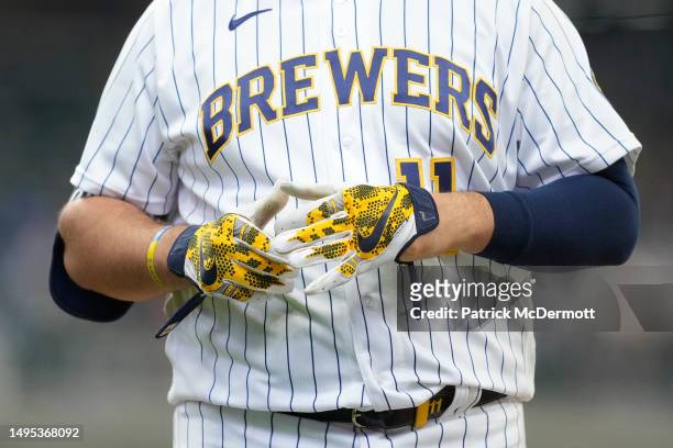 Detail view as Rowdy Tellez of the Milwaukee Brewers takes off his Nike batting gloves against the Boston Red Sox after the seventh inning at...