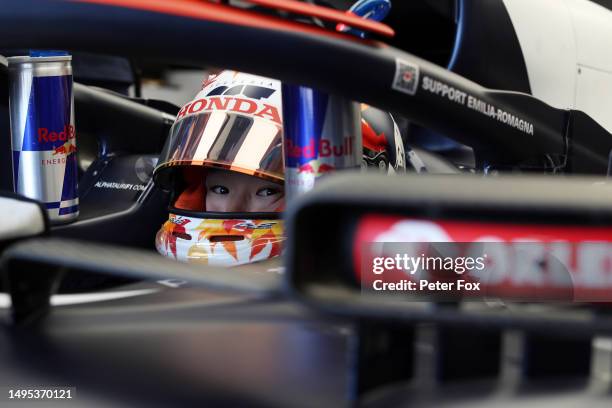 Yuki Tsunoda of Japan and Scuderia AlphaTauri prepares to drive in the garage during practice ahead of the F1 Grand Prix of Spain at Circuit de...