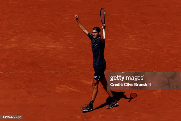 Lorenzo Sonego of Italy celebrates after winning the fourth set against Andrey Rublev during the Men's Singles Third Round match on Day Six of the...