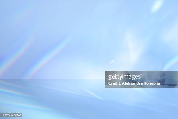 dreamy surreal pastel blue colored display background with disco crystal caustic light effect. empty 3d stage template. trendy natural colors - stage light 3d stock pictures, royalty-free photos & images