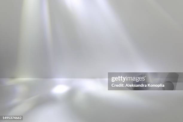 modern studio backdrop - abstract empty stage with dreamy crystal reflections on neutral gray background. surreal caustic disco light effect - 3d stage stockfoto's en -beelden