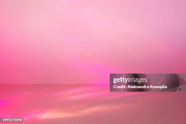 empty neon magenta pink colored scene - abstract studio room, stage background with crystal rainbow light refraction, disco ball light effects, front view, copy space - toile de fond photos et images de collection