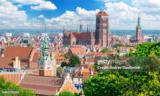 gdansk old town view from góra gradowa: st. mary's basilica and surrounding buildings. - pomorskie province stock pictures, royalty-free photos & images