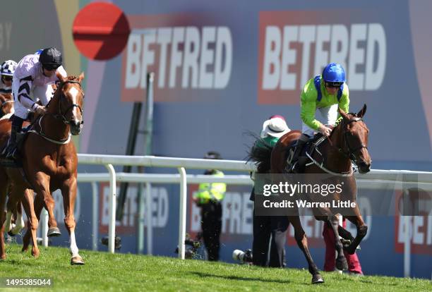 Austrian Theory ridden by Joe Fanning wins the Racehorse Lotto Handicap Stakes during Ladies Day of the Derby Festival at Epsom Downs Racecourse on...