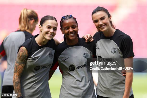 Maria Leon, Geyse and Ingrid Syrstad Engen of FC Barcelona pose for a photo during a training session prior to the UEFA Women's Champions League...