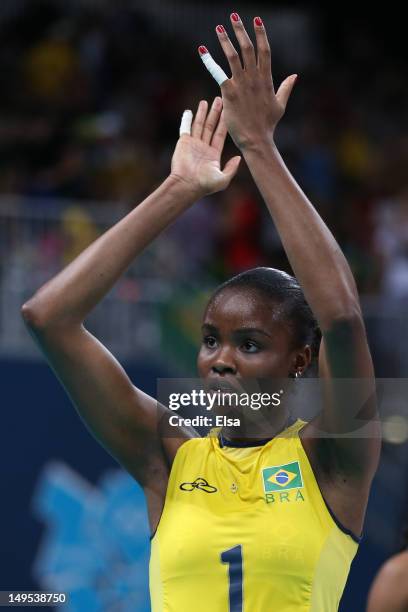 Fabiana Claudino of Brazil celebrates winning the third set in the Women's Volleyball Preliminary match between the United States and Brazil on Day 3...