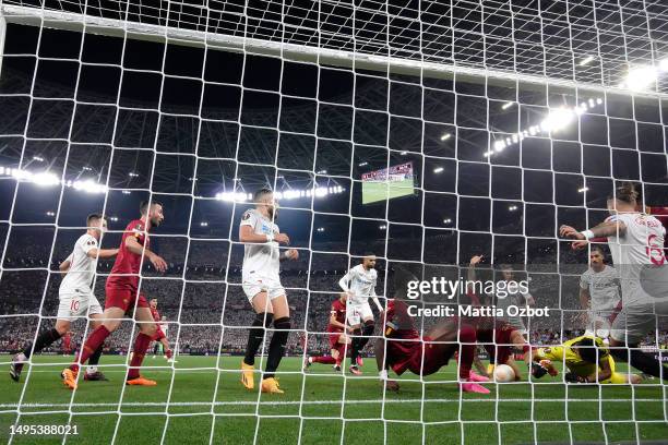 Tammy Abraham of AS Roma and Yassine Bounou of Sevilla FC in action during the UEFA Europa League 2022/23 final match between Sevilla FC and AS Roma...