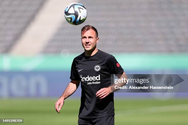 Mario Götze of Eintracht Frankfurt controls the ball during a training session one day ahead of the DFB Cup Final between RB Leipzig and Eintracht...