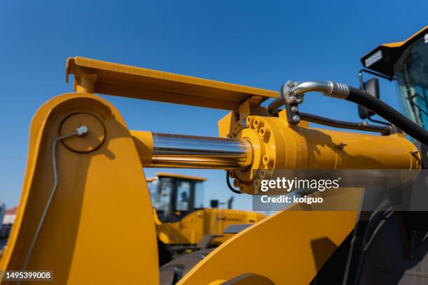 close-up of forklift arm - hydraulics foto e immagini stock