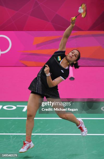 Saina Nehwal of India returns a shot against Lianne Tan of Belgium during their Womens Singles Badminton during Badminton match on Day 3 of the...