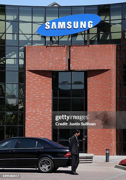 Car waits in front of a Samsung Electronics office on July 30, 2012 in San Jose, California. The trial in the Apple Inc. And Samsung Electronics Co....