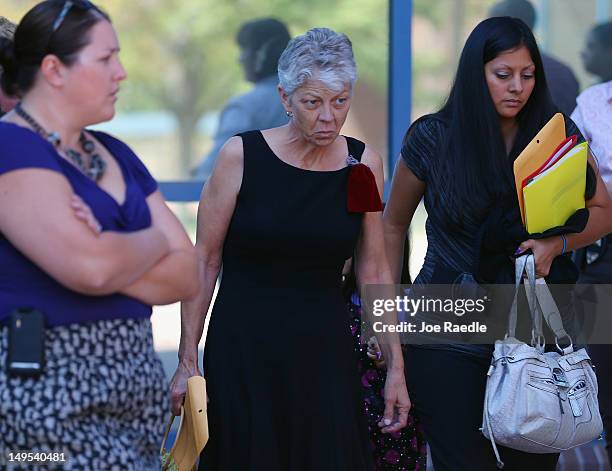 Cheryl Wygal , the mother of Rebecca Wingo, who was killed during the shooting at the screening of The Dark Knight Rises leaves the Arapahoe County...