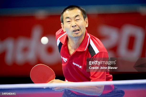 Summer Olympics: Argentina Liu Song in action vs Slovenia Bojan Tokic during Men's Singles 2nd Round at ExCeL London. London, United Kingdom...