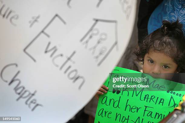 Daniela Hernandez protests with her mother and members of Occupy Chicago, the Chicago Anti-Eviction Campaign, and Communities United Against...