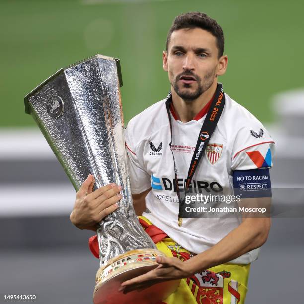 Jesus Navas of Sevilla celebrates with the trophy following the penalty shoot out victory in the UEFA Europa League 2022/23 final match between...