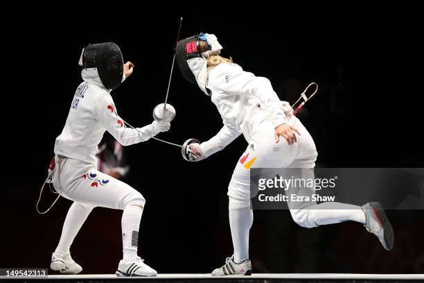 Britta Heidemann of Germany scores the final point against A Lam Shin of Korea in the Women's Epee Individual Fencing Semifinals on Day 3 of the...