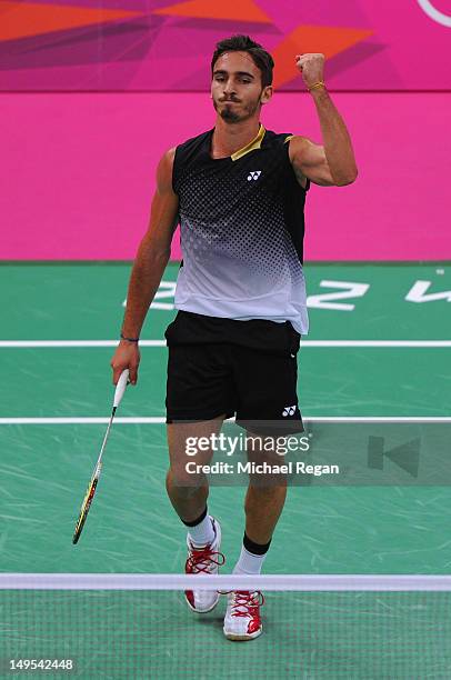 Pedro Martins of Portugal celebrates a point against Peter Gade of Denmark during their Mens Singles Badminton on Day 3 of the London 2012 Olympic...