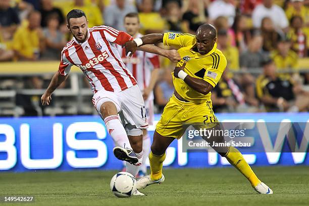 Marc Wilson of Stoke City FC and Emilio Renteria of the Columbus Crew battle for control of the ball on July 24, 2012 at Crew Stadium in Columbus,...