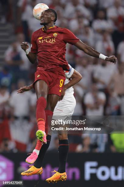 Tammy Abraham of AS Roma heads on from Fernando of Sevilla during the UEFA Europa League 2022/23 final match between Sevilla FC and AS Roma at Puskas...