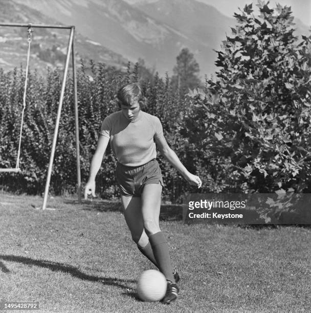Twelve year-old Swiss footballer Madeleine Boll in training, Switzerland, October 1965. Initially with the FC Sion junior side, Boll had her license...