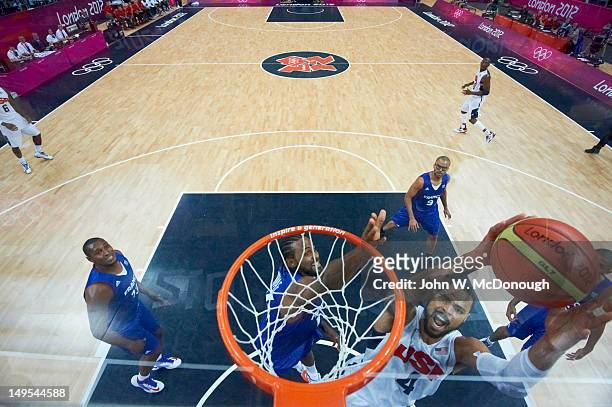 Summer Olympics: Aerial view of USA Tyson Chandler in action, dunk vs France during Men's Preliminary Round - Group A at Basketball Arena. London,...