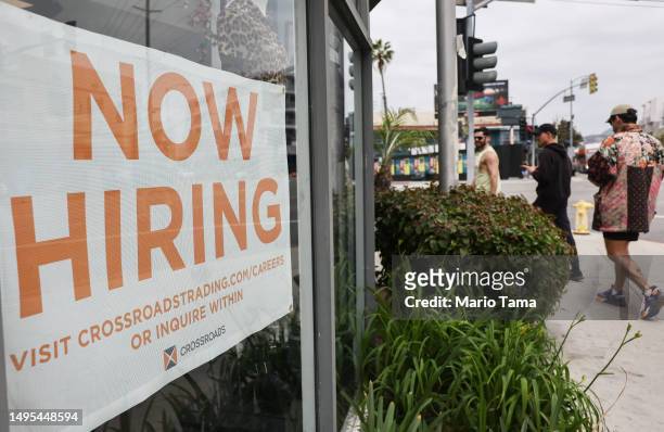 Now Hiring' sign is displayed outside a resale clothing shop on June 2, 2023 in Los Angeles, California. Today’s U.S. Labor report shows that...