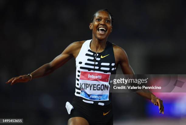 Faith Kipyegon of Team Kenya celebrates victory in the Women's 1500m during the Golden Gala Pietro Mennea, part of the Diamond League series at...