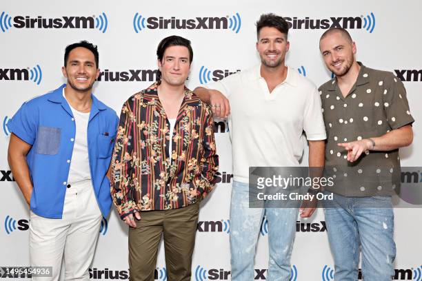 Carlos PenaVega, Logan Henderson, James Maslow and Kendall Schmidt of Big Time Rush visit the SiriusXM Studios on June 02, 2023 in New York City.