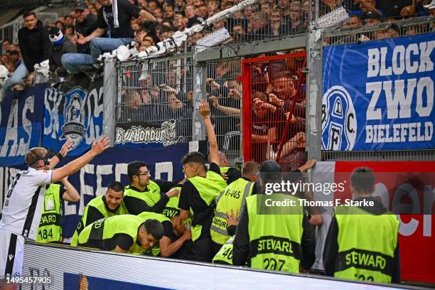 Fabian Klos of Bielefeld tries to calm his supporters during the Second Bundesliga playoffs first leg match between SV Wehen Wiesbaden and DSC...