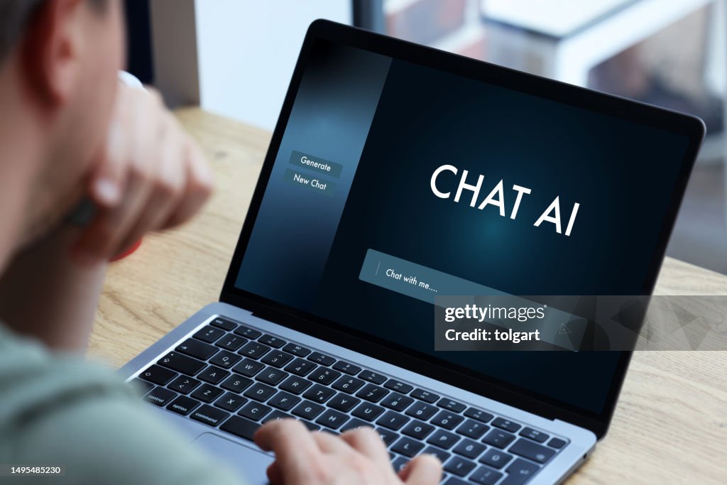Man using laptop with artificial intelligence screen