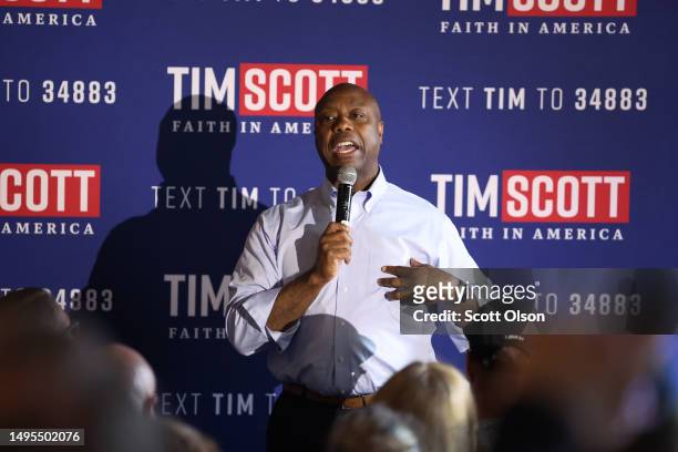 Republican presidential candidate Senator Tim Scott speaks to guests during a town hall meeting at Barley's Bar and Grill on June 02, 2023 in Council...