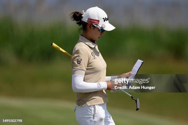 Chella Choi of South Korea lines up a putt on the 14th green during the second round of the Mizuho Americas Open at Liberty National Golf Club on...