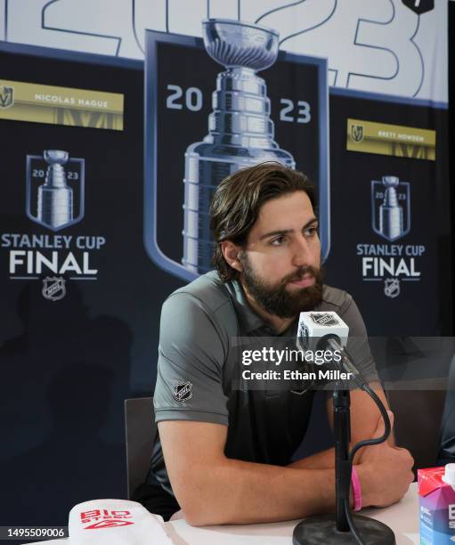 Nicolas Hague of the Vegas Golden Knights is interviewed during Media Day for the 2023 NHL Stanley Cup Final between the Florida Panthers and the...