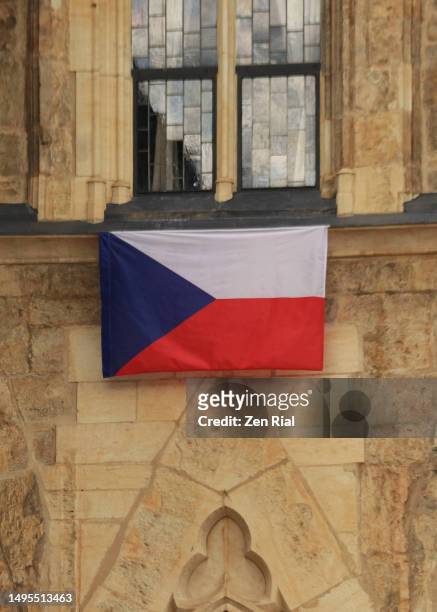flag of czech republic in the old town of prague - czech republic stock pictures, royalty-free photos & images