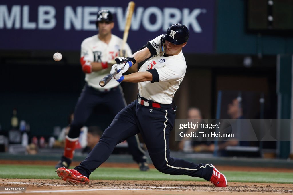 Seattle Rangers Corey Seager of the Texas Rangers singles in the sixth inning against ...