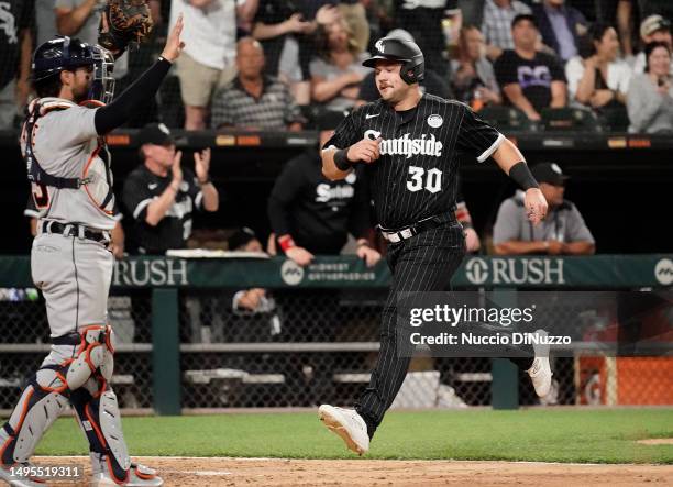 Jake Burger of the Chicago White Sox scores during the seventh inning against the Detroit Tigers at Guaranteed Rate Field on June 02, 2023 in...