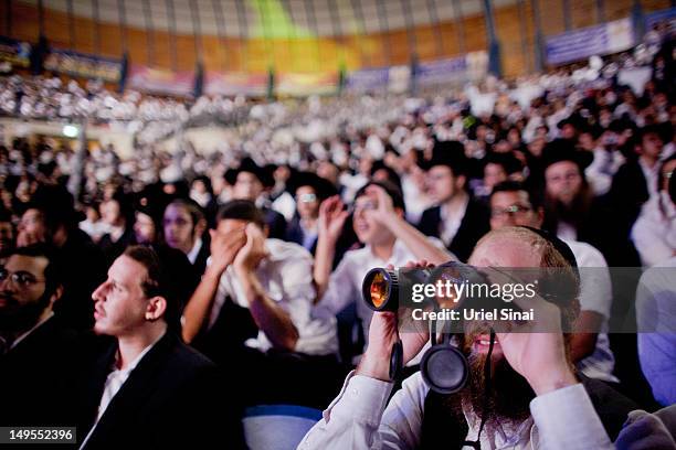 Tens of thousands of Ultra Orthodox Jews attend Siyum HaShas, a celebration marking completion of a seven-and a half year daily study-cycle of the...