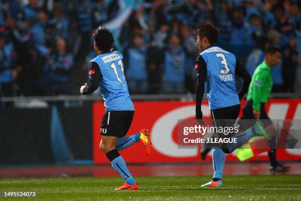 Yu Kobayashi of Kawasaki Frontale celebrates with teammate Yusuke Tanaka after scoring the team's first goal during the J.League J1 match between...